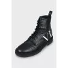 Leather boots with text print