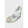 Patent leather shoes with metal heels