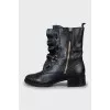 Leather boots decorated with frills