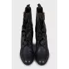 Leather boots decorated with frills