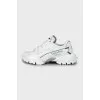 White sneakers with brand logo