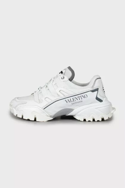 White sneakers with brand logo