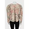 Cropped blouse with voluminous sleeves