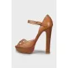 Brown heeled sandals