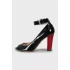 Patent leather sandals with contrasting heels