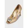 Gold-tone snakeskin shoes