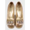 Gold-tone snakeskin shoes