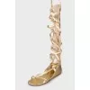 Gold lace-up sandals
