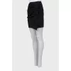 Mini skirt with draping and tag