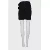 Mini skirt with draping and tag