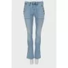 Flared jeans with gold buttons