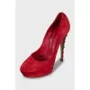 Suede shoes with heel decoration