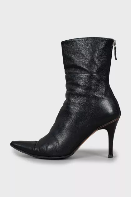 Black leather ankle boots with pointed toe