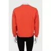 Sweatshirt with print and ties at the bottom