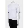 Perforated T-shirt with ruffles on the sleeves