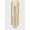 Silk flared trousers with embroidery