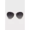 Sunglasses with gold frame and temples