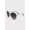 Sunglasses with gold frame and temples