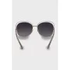 Sunglasses with gold frame and temples
