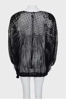 Semi-transparent dress with a pattern