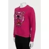 Pink sweatshirt with signature print