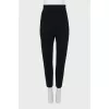 Tapered trousers with sharpened creases