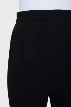 Tapered trousers with sharpened creases