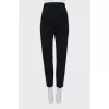 Tapered trousers with sharpened creases