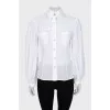 Shirt with perforation and voluminous sleeves