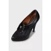 Leather shoes with gold decor