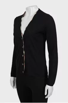 Knitted cardigan with a plaid print