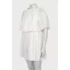 Pleated dress with frill