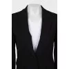 Fitted jacket with seams on the outside