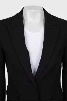Fitted jacket with seams on the outside