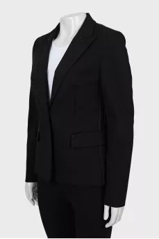 Fitted jacket with seams on the outside