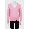 Pink jumper with perforation