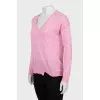 Pink jumper with perforation