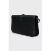 Leather shoulder bag with tag