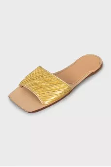 Leather flip flops in gold color