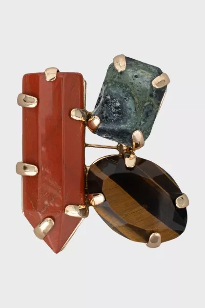 Golden brooch with crystals