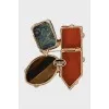 Golden brooch with crystals