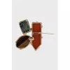 Golden brooch with crystals