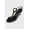 Leather sandals with golden stiletto heels