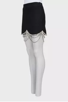 Mini skirt with crystals and tag