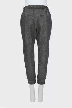 Trousers with printed pattern and raised seams