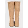 Brown boots with perforation on suede