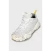 White sneakers with a textured sole