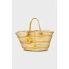 Woven bag with leather straps