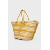 Woven bag with leather straps