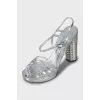 Silver sandals with heel decoration